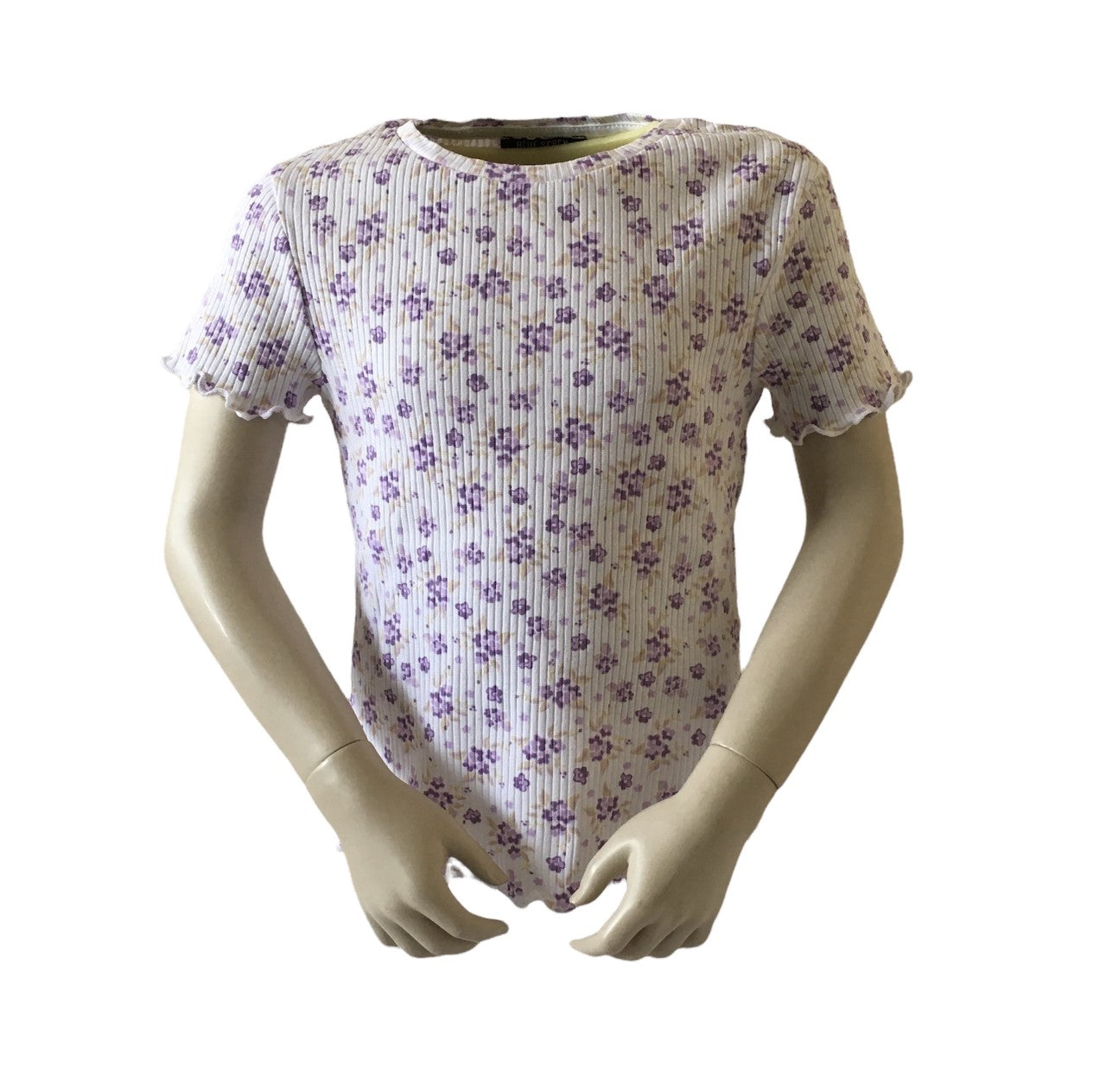 T shirt met paarse bloemen is een kort model met een ronde hals. 95% katoen en 5% elastan en verkrijgbaar in de maten 140, 152 en 164.