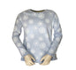 Shirt licht blauw met sneeuwsterren met roezels aan de mouwen. 100% katoen en verkrijgbaar in de maten 92 t/m 128.